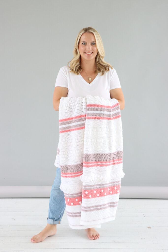 girl with crochet blanket