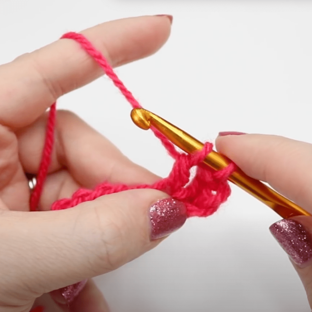 Two loops on the hook for a treble crochet