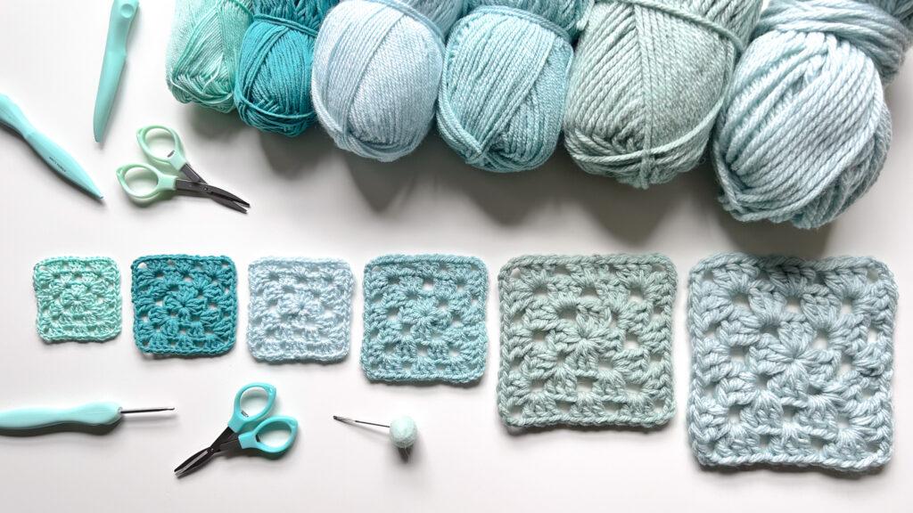 crochet granny squares made in different types of yarn.