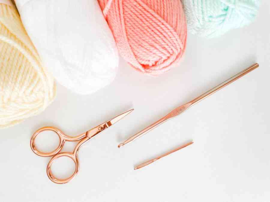 Yarn, Scissors, Crochet Hook and Darning Needle